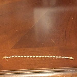 Cubic zirconia and fake gold tennis bracelet